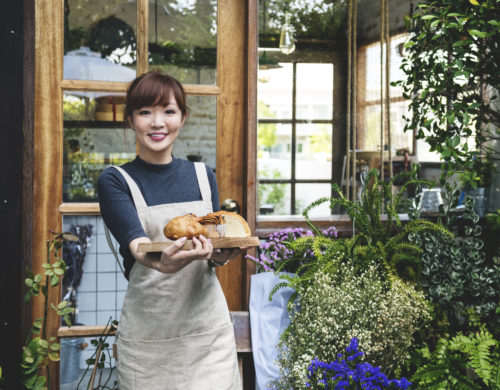 Young asian lady entrepreneur bakery garden